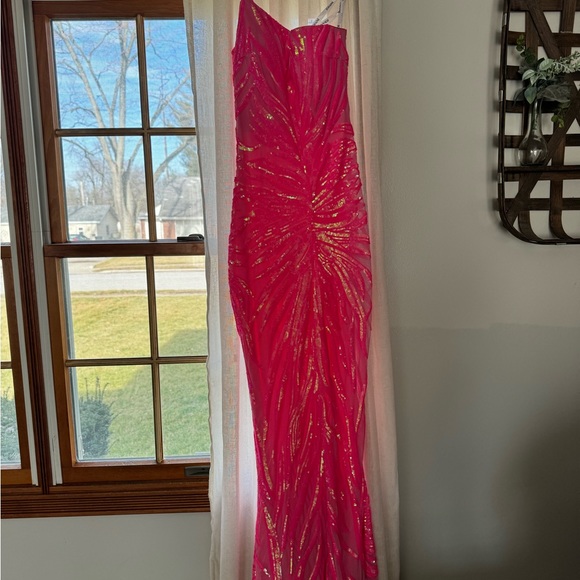 This prom dress is gorgeous! Hot pink…Size 2.. Jovani. - Picture 8 of 9
